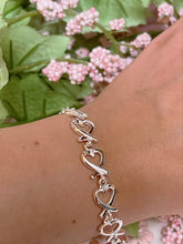 Load image into Gallery viewer, Heart Knot sterling silver bracelet
