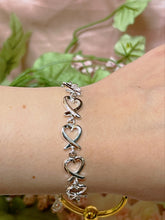 Load image into Gallery viewer, Heart Knot sterling silver bracelet
